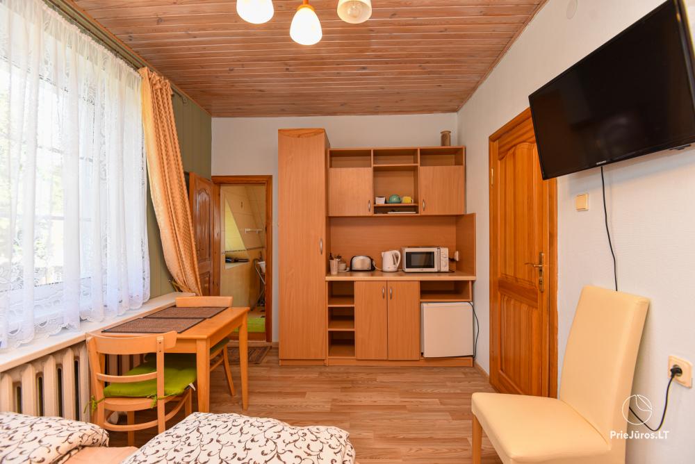 Rental of private rooms with amenities in the cottage JOANA in Nida