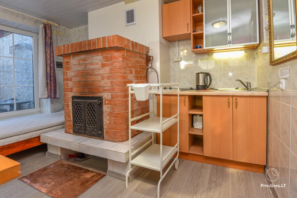 Rental of private rooms with amenities in the cottage JOANA in Nida