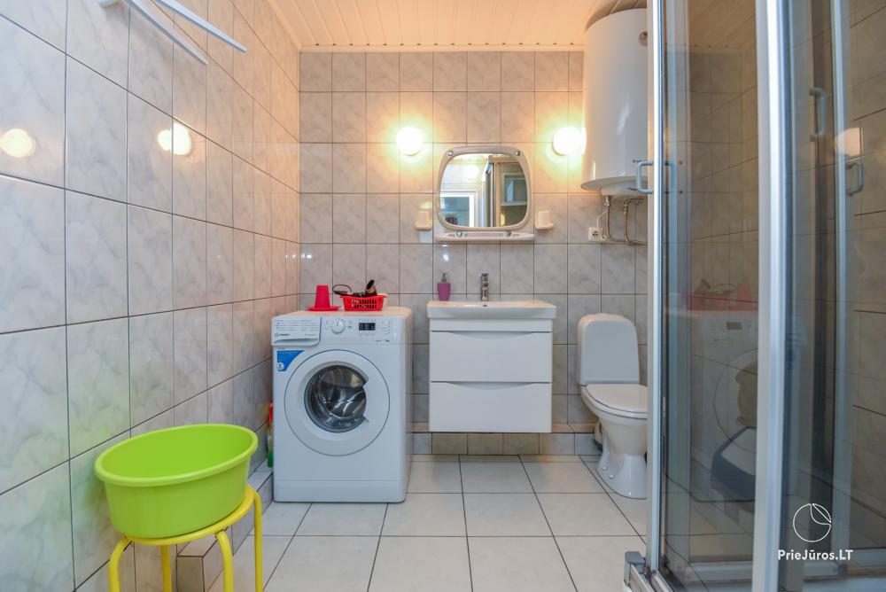 Rental of private rooms with amenities in the cottage JOANA in Nida