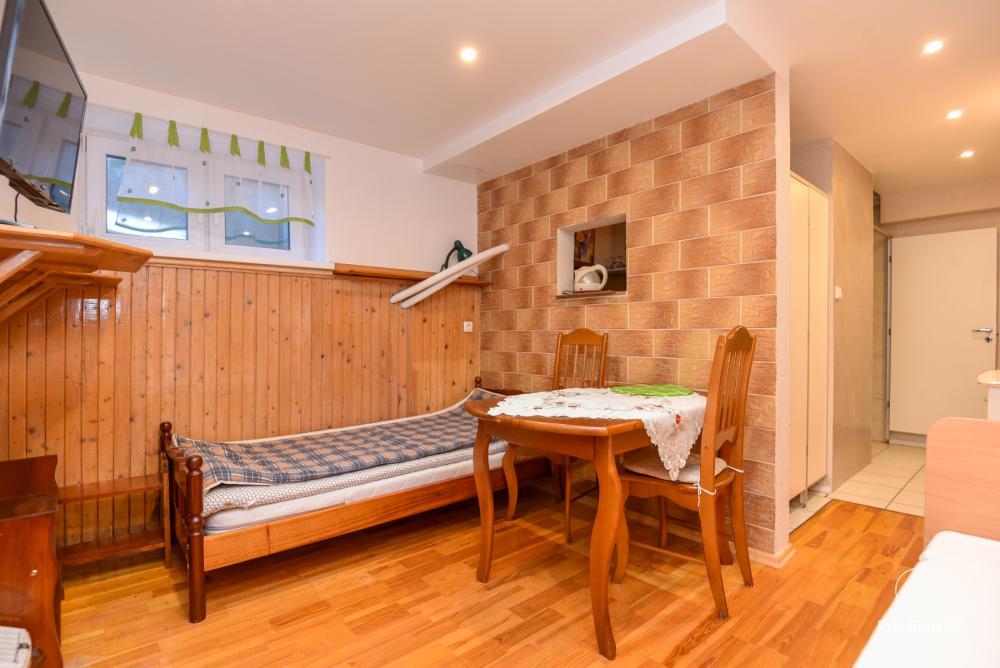 Rental of private rooms with amenities in the cottage JOANA in Nida