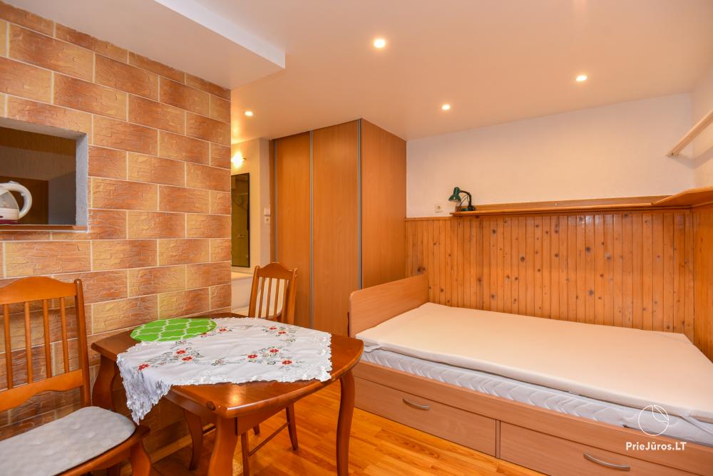 Rental of private rooms with amenities in the cottage JOANA in Nida