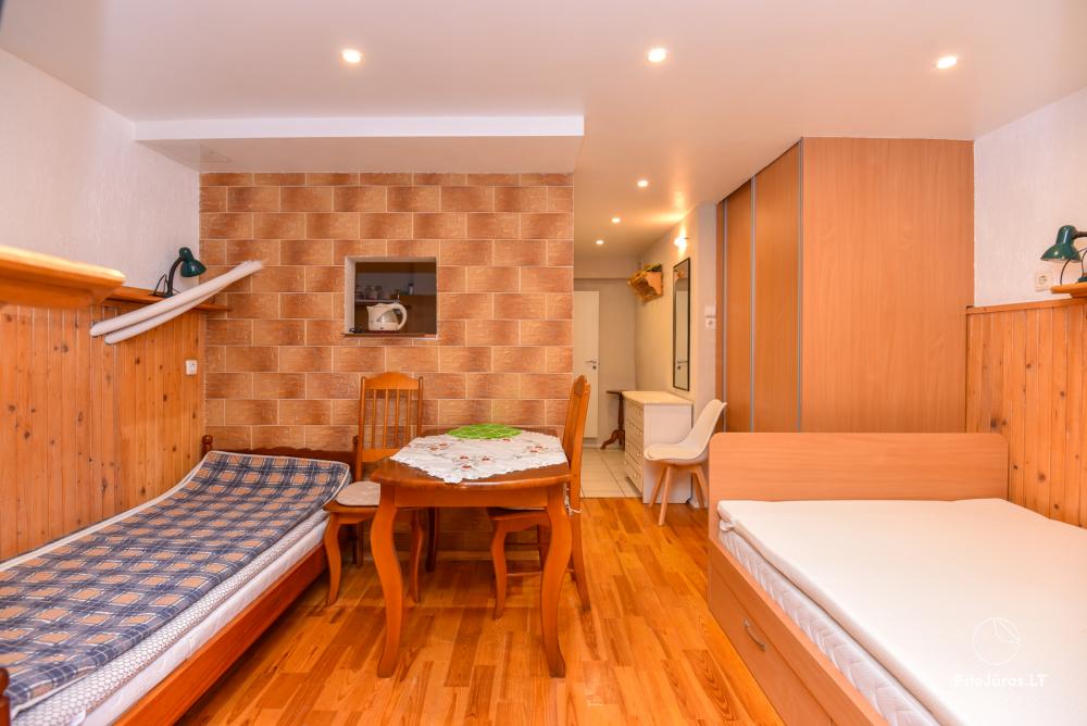 Rental of private rooms with amenities in the cottage JOANA in Nida