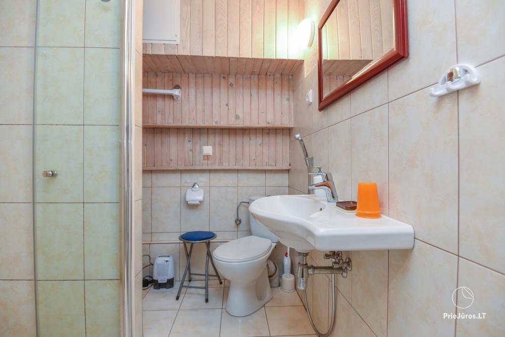 Rental of private rooms with amenities in the cottage JOANA in Nida