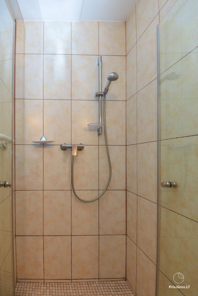 Rental of private rooms with amenities in the cottage JOANA in Nida