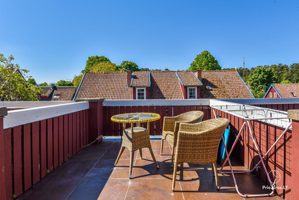 Rental of private rooms with amenities in the cottage JOANA in Nida