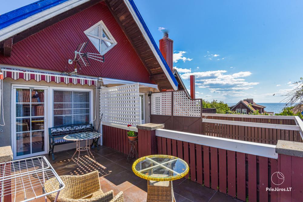 Rental of private rooms with amenities in the cottage JOANA in Nida