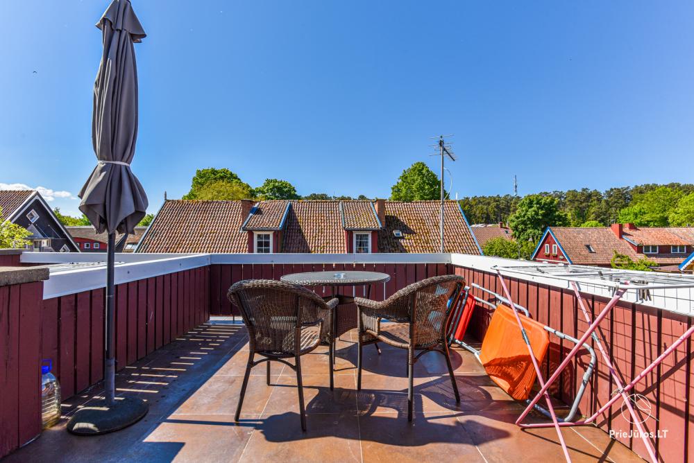Rental of private rooms with amenities in the cottage JOANA in Nida