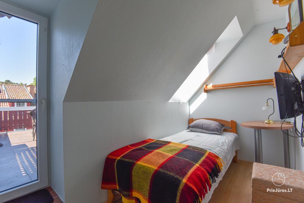 Rental of private rooms with amenities in the cottage JOANA in Nida