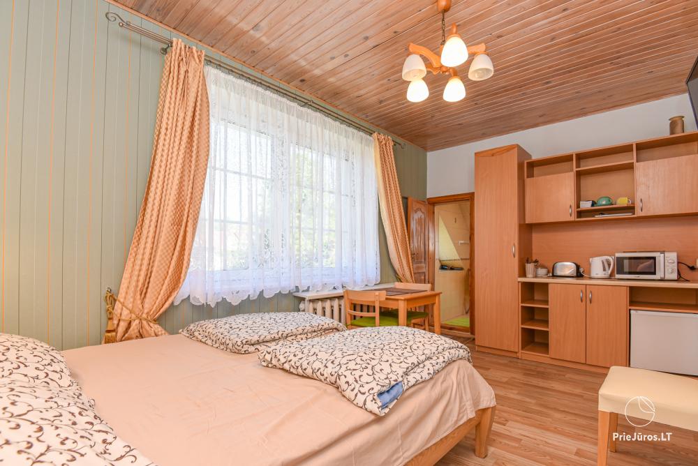 Rental of private rooms with amenities in the cottage JOANA in Nida