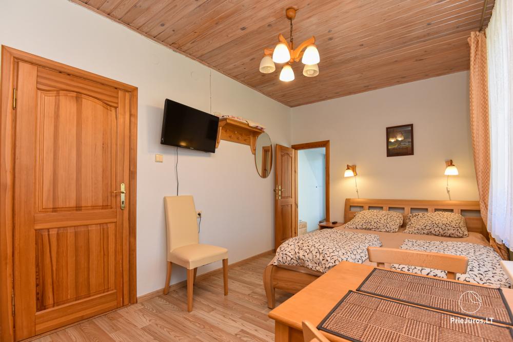 Rental of private rooms with amenities in the cottage JOANA in Nida