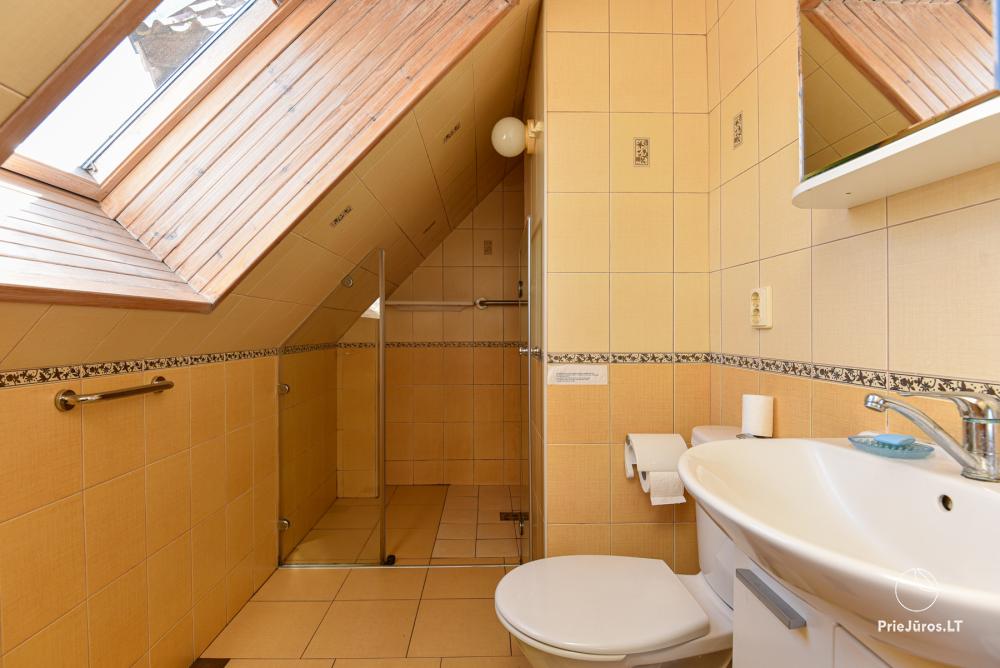 Rental of private rooms with amenities in the cottage JOANA in Nida