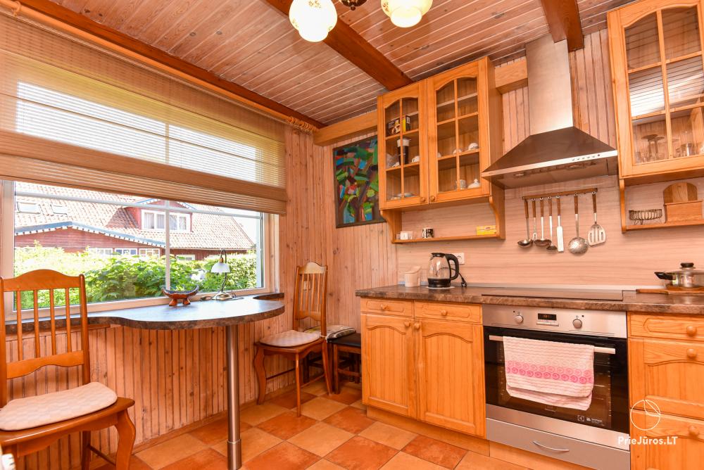 Rental of private rooms with amenities in the cottage JOANA in Nida