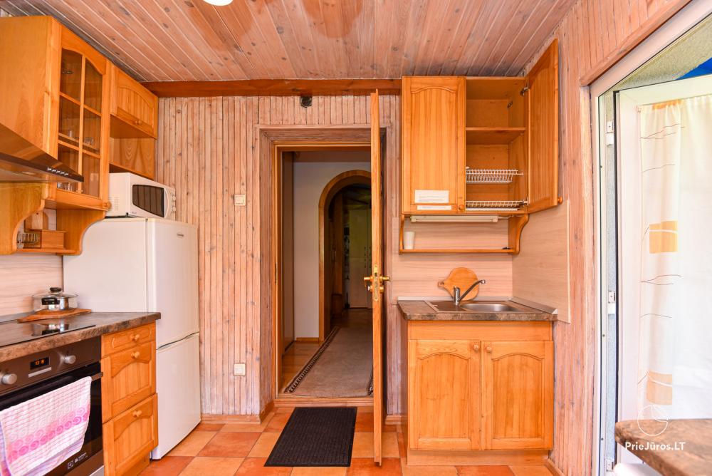 Rental of private rooms with amenities in the cottage JOANA in Nida
