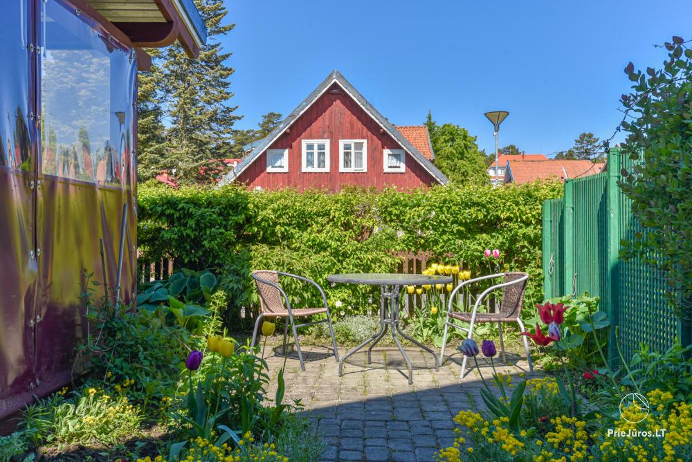 Rental of private rooms with amenities in the cottage JOANA in Nida
