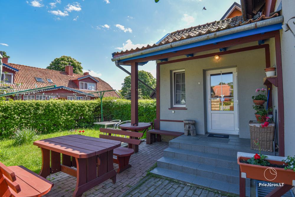 Rental of private rooms with amenities in the cottage JOANA in Nida