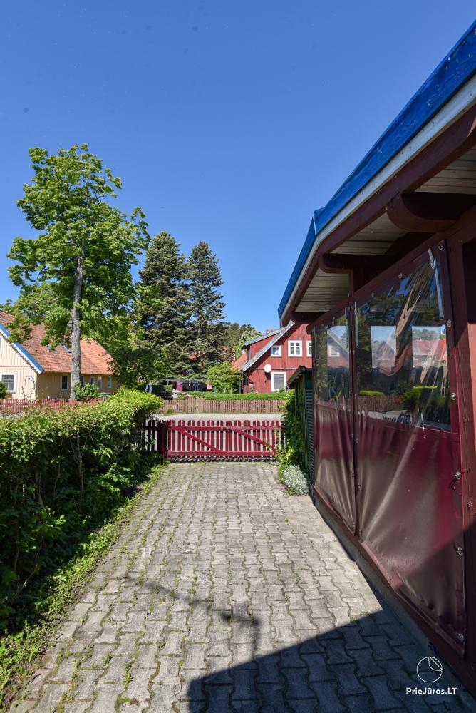 Rental of private rooms with amenities in the cottage JOANA in Nida