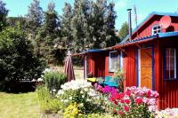 Two apartments with a yard and a hot tub in Preila