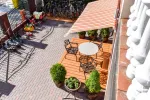 In Kunigiskiai, in Villa Optimistas apartments, rooms with kitchenettes, terraces or balconies. Two bedrooms holiday house with terrace. - 5