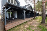 Guesthouse “Paukščių takas - Vertikalė” newly furnished rooms with private entrances, terraces in Šventoji!