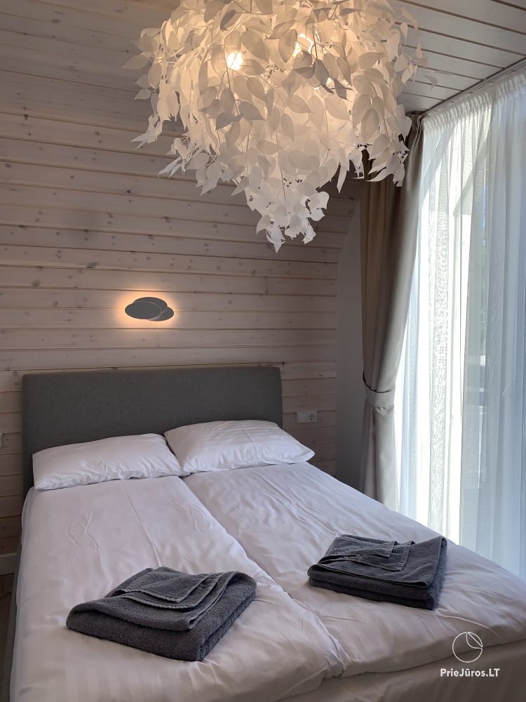 Geriausios atostogos - cottages with heated pool for rent in Kunigiskes