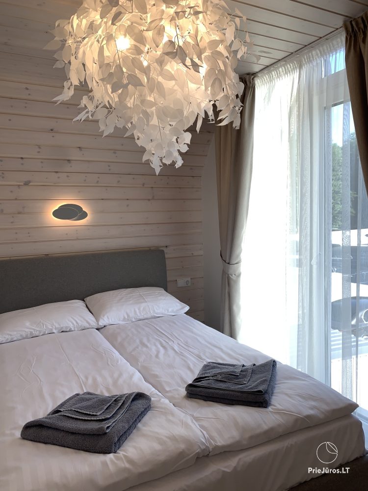 Geriausios atostogos - cottages with heated pool for rent in Kunigiskes