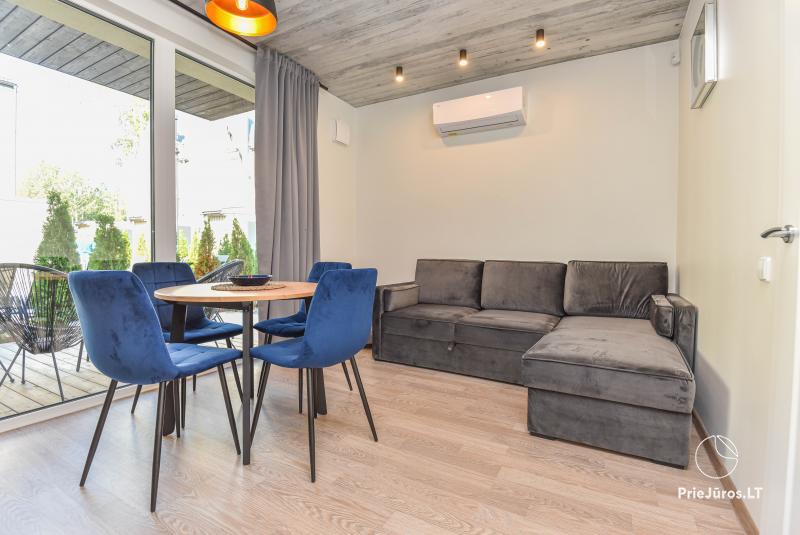 New apartment with heated pool surrounded by pine forest