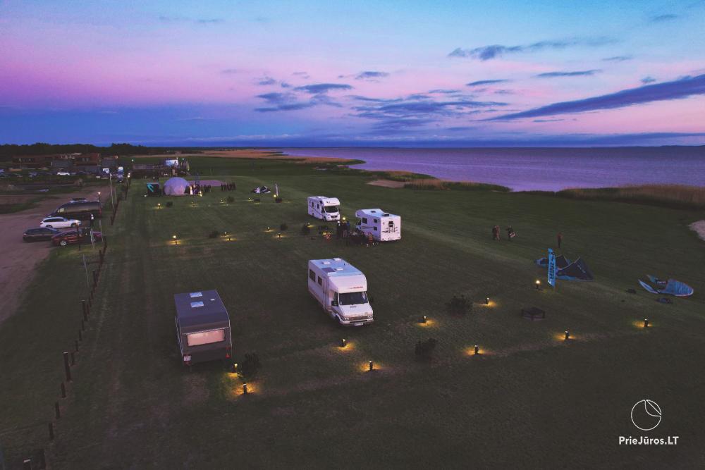 Fenas Kite Spot camping on the shore of the lagoom, in Lithuania, in Svencele - 1