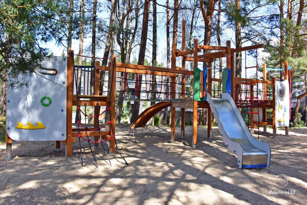 Новые, просторные апартаменты «Palangos Vilnene» в окружении соснового леса, недалеко от моря с кондиционером и просторными террасами с видом на сосновый лес и морe