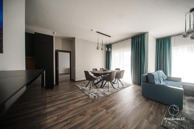 Kintų Perlas Villa Rental. Surrounded by the tranquil nature of the Pamario region, 500 meters from the sandy Curonian Lagoon beach.