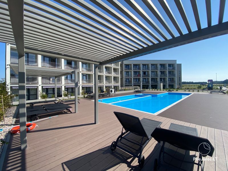 Newly furnished flat for rent in Sventoji. Heated swimming pool in the yard