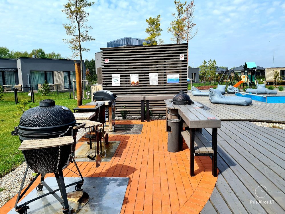 Auksinis Laikas Home - Mano jūra 1, Kunigiškiai apartments on the ground floor with a nice terrace, pool, hot tub, sauna in the complex