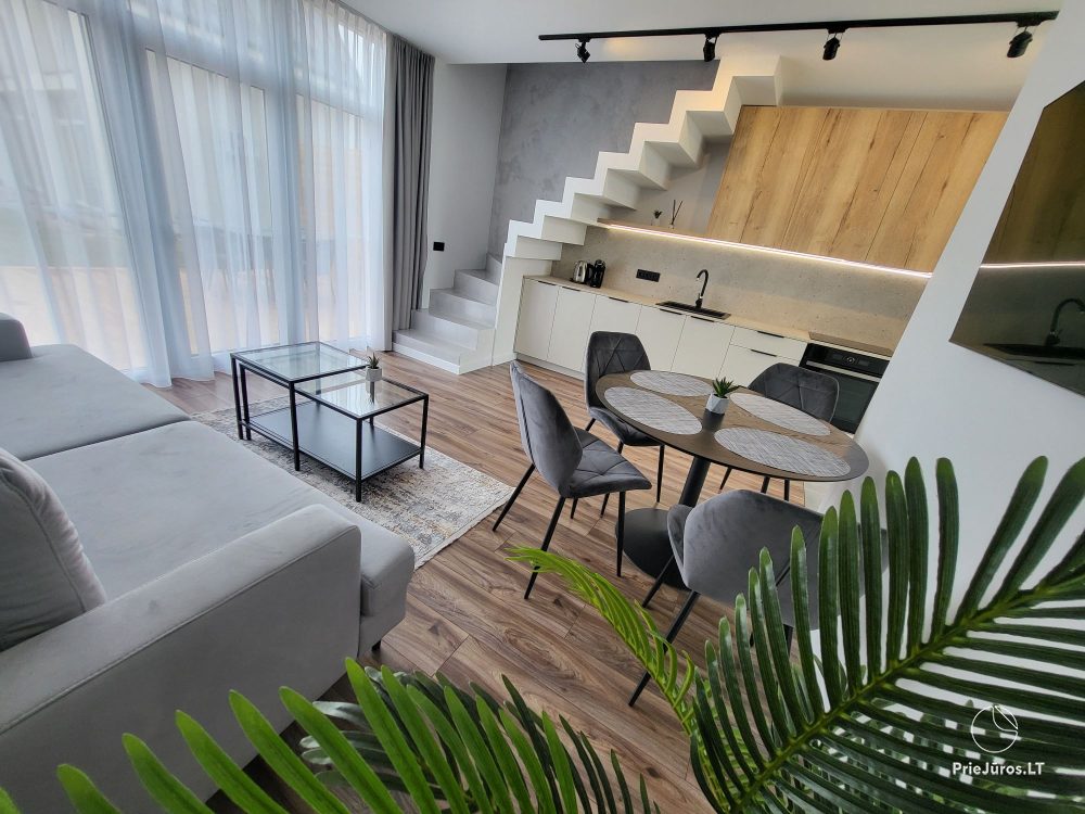 New cottage with spacious terrace up to 6 persons in Kunigiskiai