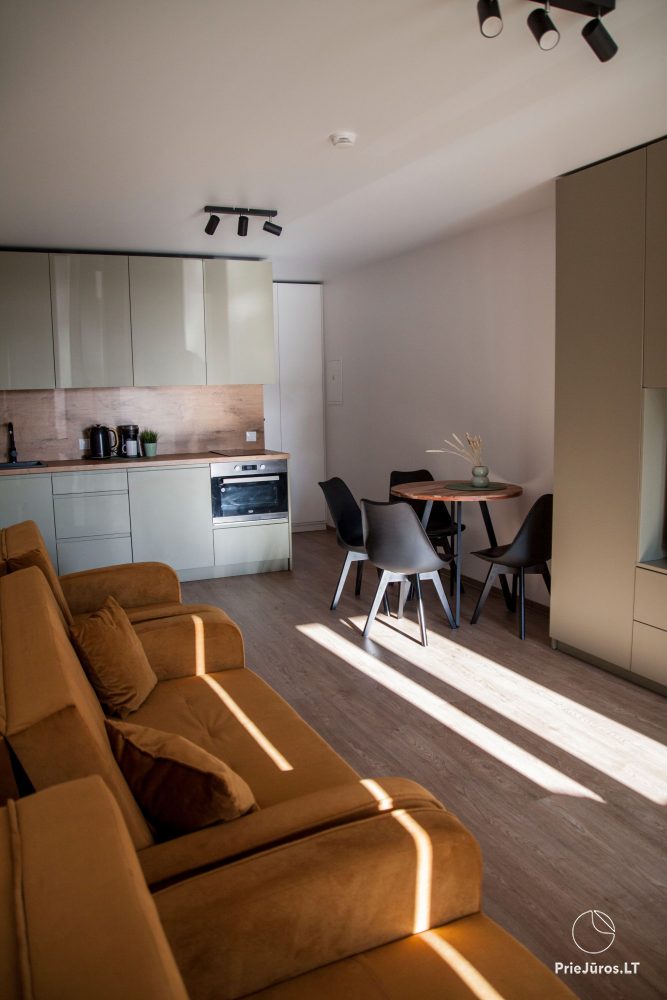 Cozy apartment with heated outdoor pool, gym and children's playroom near the sea!