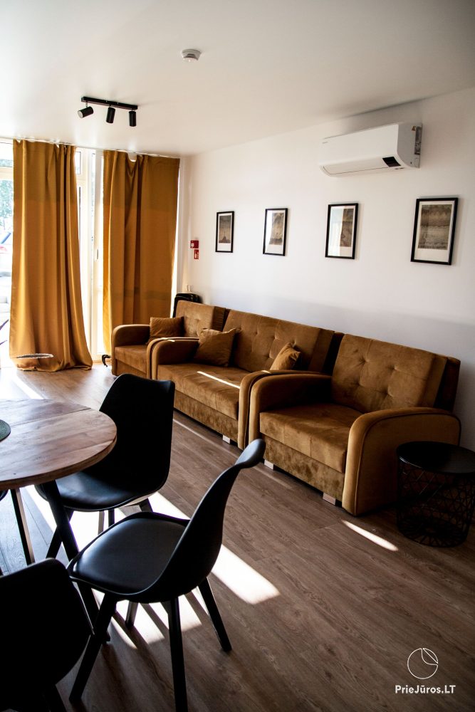 Cozy apartment with heated outdoor pool, gym and children's playroom near the sea!