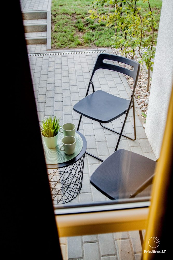 Cozy apartment with heated outdoor pool, gym and children's playroom near the sea!