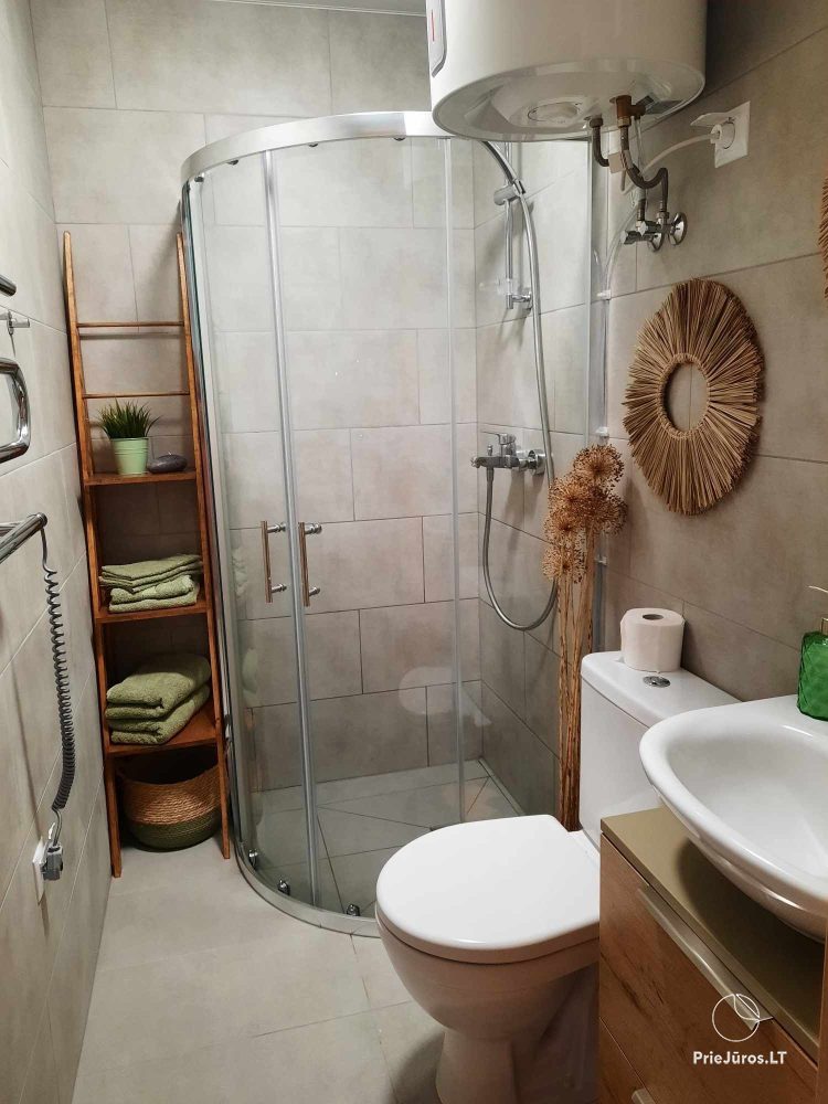 Cozy apartment with heated outdoor pool, gym and children's playroom near the sea!