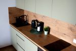 Cozy apartment with heated outdoor pool, gym and children's playroom near the sea!
