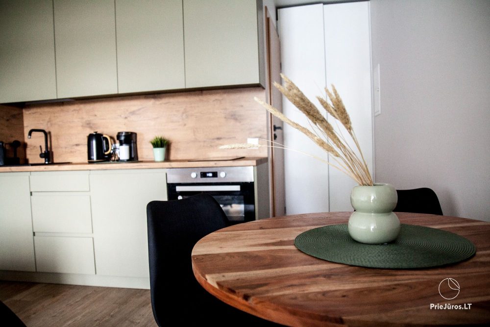 Cozy apartment with heated outdoor pool, gym and children's playroom near the sea!