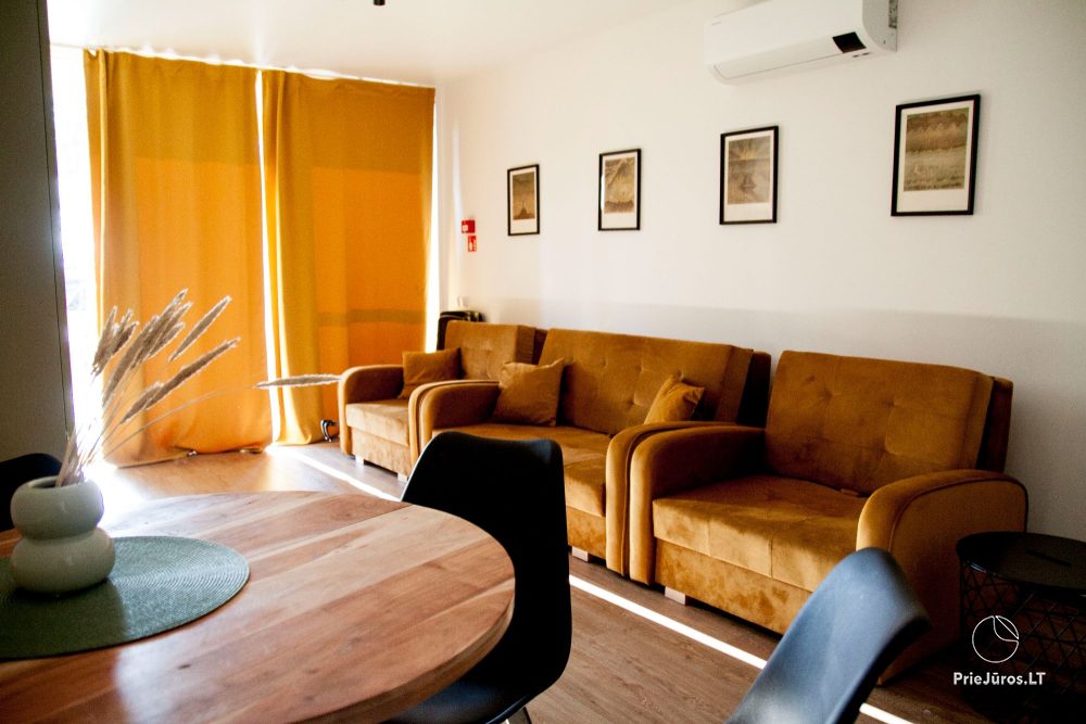 Cozy apartment with heated outdoor pool, gym and children's playroom near the sea!