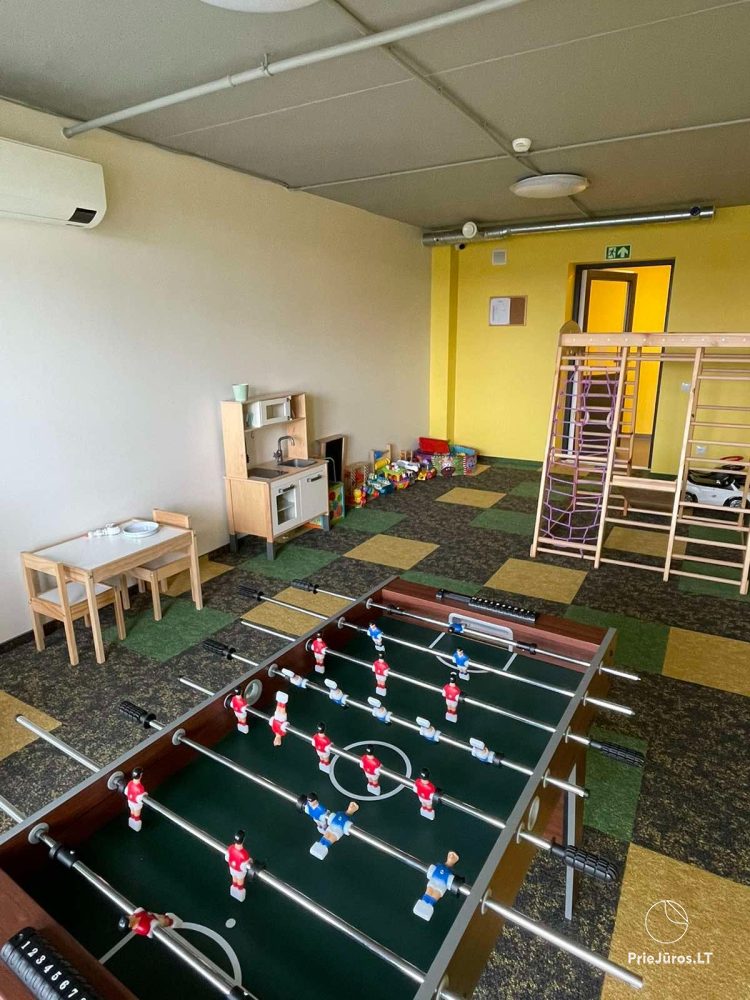 Cozy apartment with heated outdoor pool, gym and children's playroom near the sea!