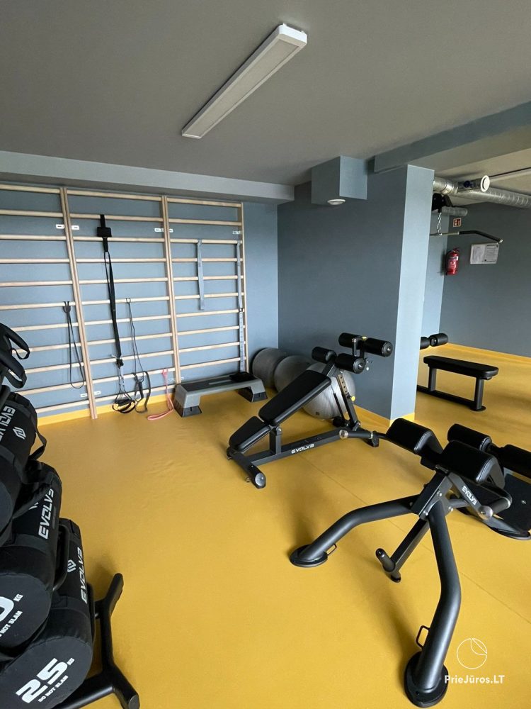 Cozy apartment with heated outdoor pool, gym and children's playroom near the sea!