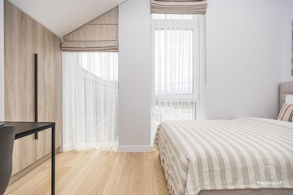 Fabula home - Monciškės - 2-bedroom, spacious cottage with a terrace for four, in the new J7 Beržas complex with pools, saunas, and barbecue