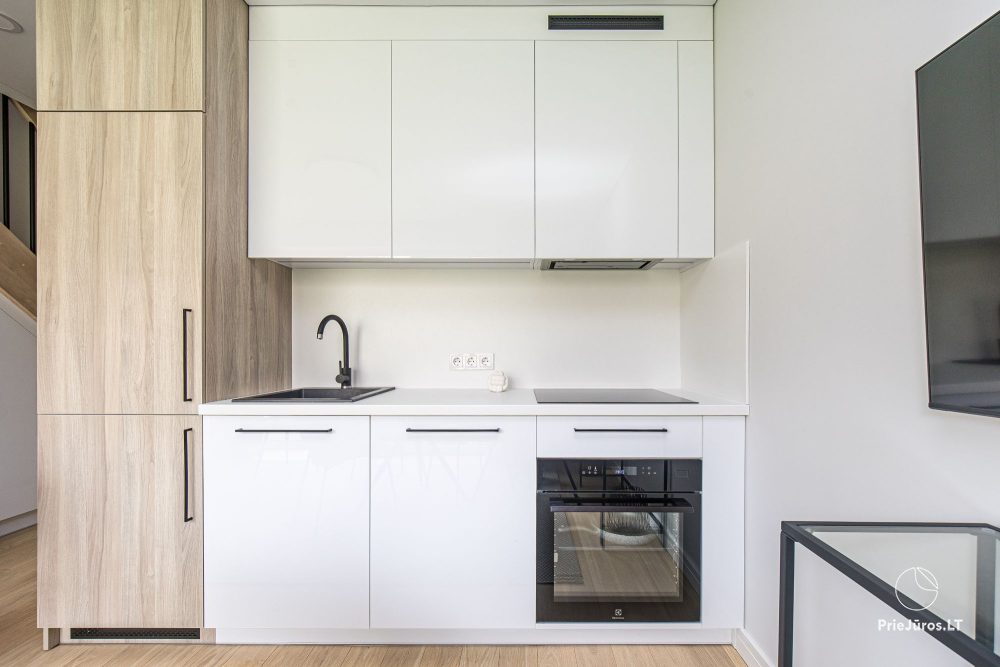 Fabula home - Monciškės - 2-bedroom, spacious cottage with a terrace for four, in the new J7 Beržas complex with pools, saunas, and barbecue