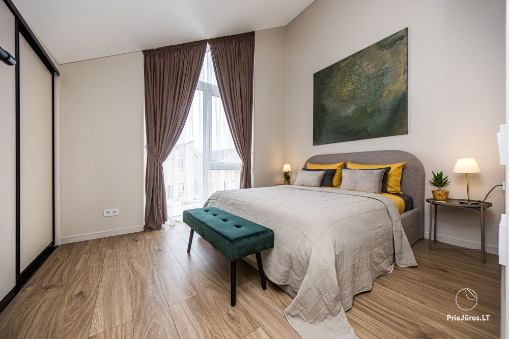 Lyrika home - в Монцишкес - просторный коттедж с террасой на четыре человека, 2 спальни, в новом квартале J7 Beržas с бассейнами, саунами и барбекю