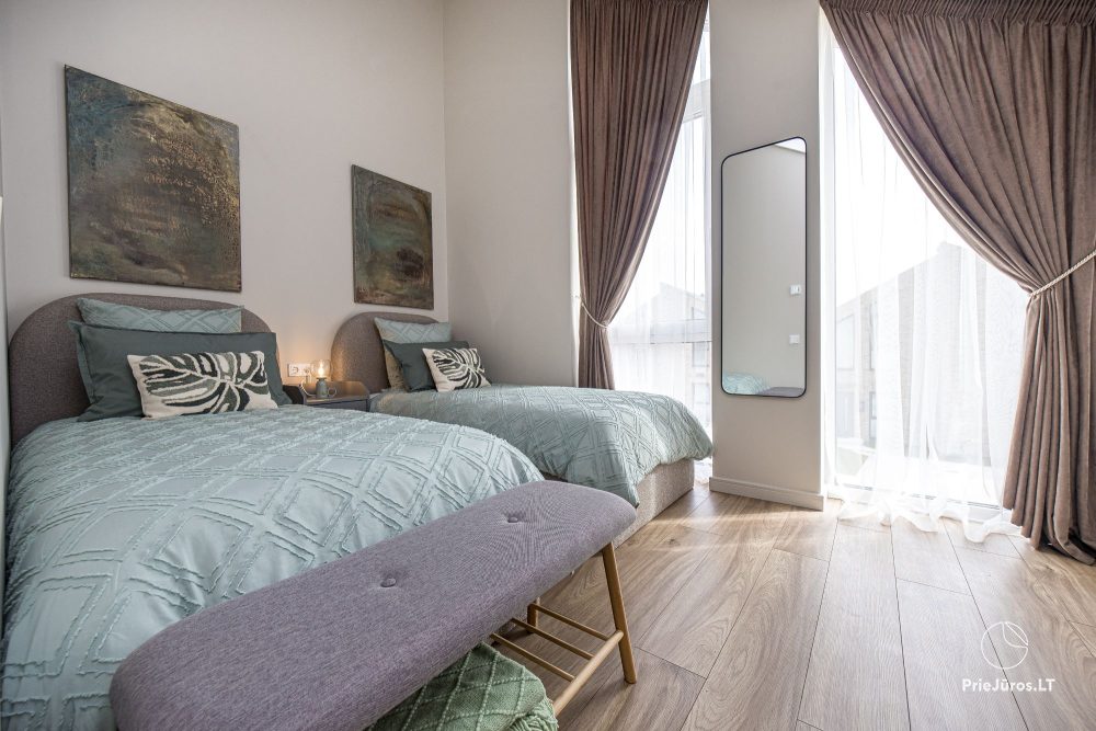Lyrika home - в Монцишкес - просторный коттедж с террасой на четыре человека, 2 спальни, в новом квартале J7 Beržas с бассейнами, саунами и барбекю