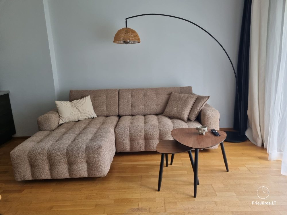 Sunny holiday flat-studio with terrace in calm place near the sea