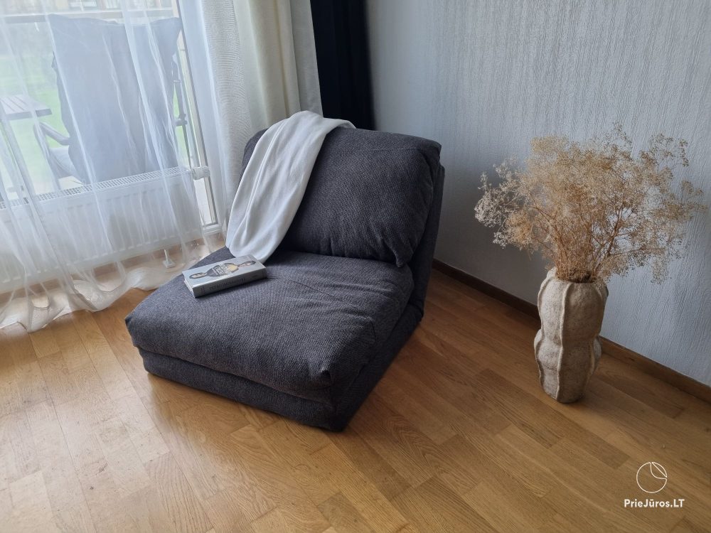 Sunny holiday flat-studio with terrace in calm place near the sea