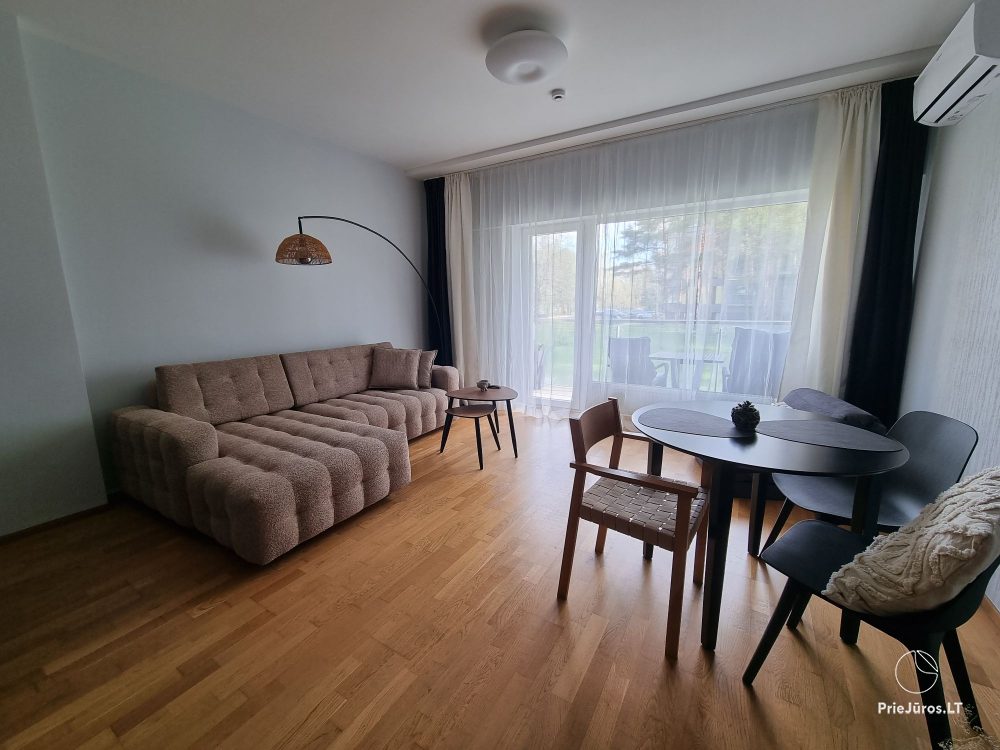 Sunny holiday flat-studio with terrace in calm place near the sea