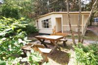 Wooden bungalows near the Baltic sea "Penguin"