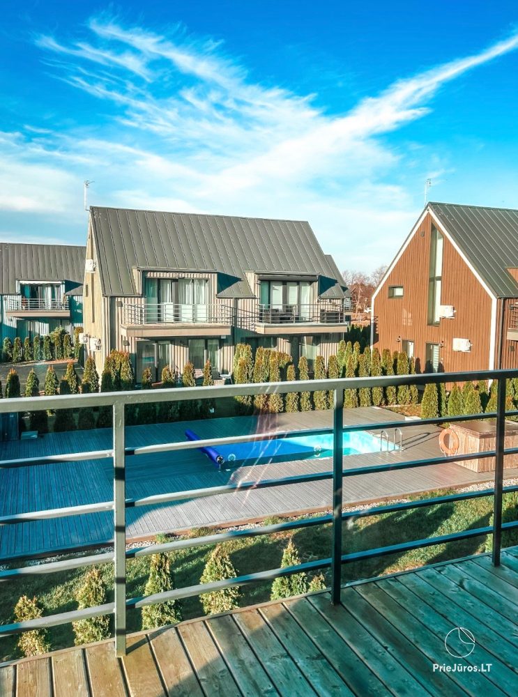Two-story apartment with heated outdoor pool - 1